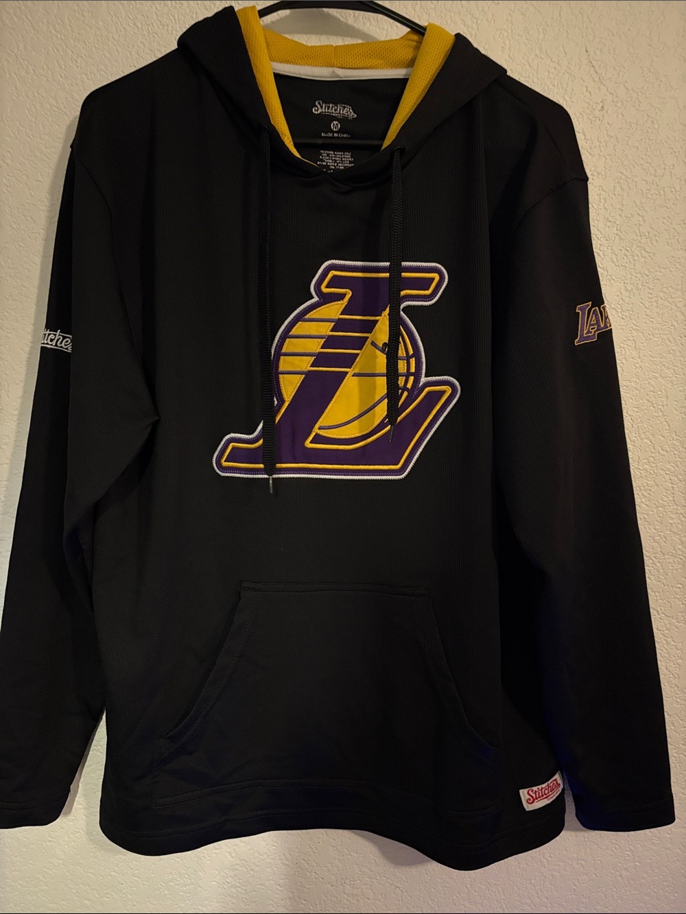 Stitches Black Hoodie with Purple and Gold Logo
